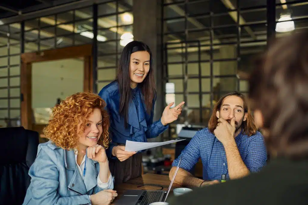 Group of young professionals collaborating in office